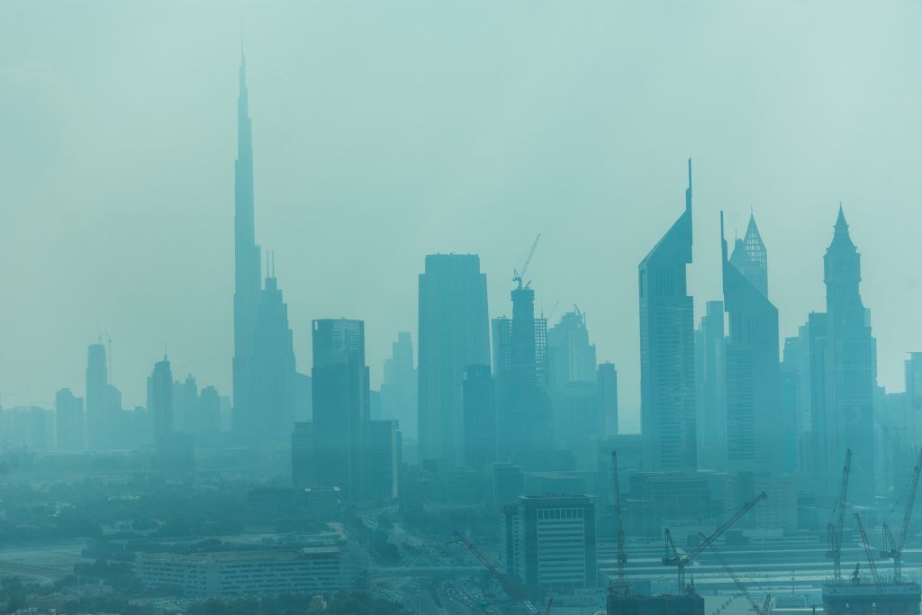 Dubai, UAE - October, 2018. Beautiful skyline of Dubai surrounded by sand dust.